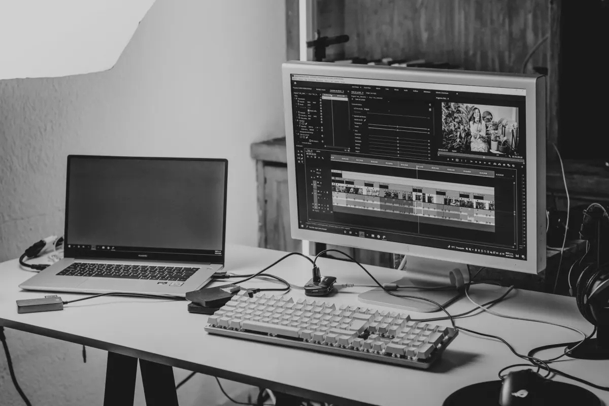 A video editing timeline on a laptop, standing in for converting a GIF to an MP4 so the loop keeps moving when posted.