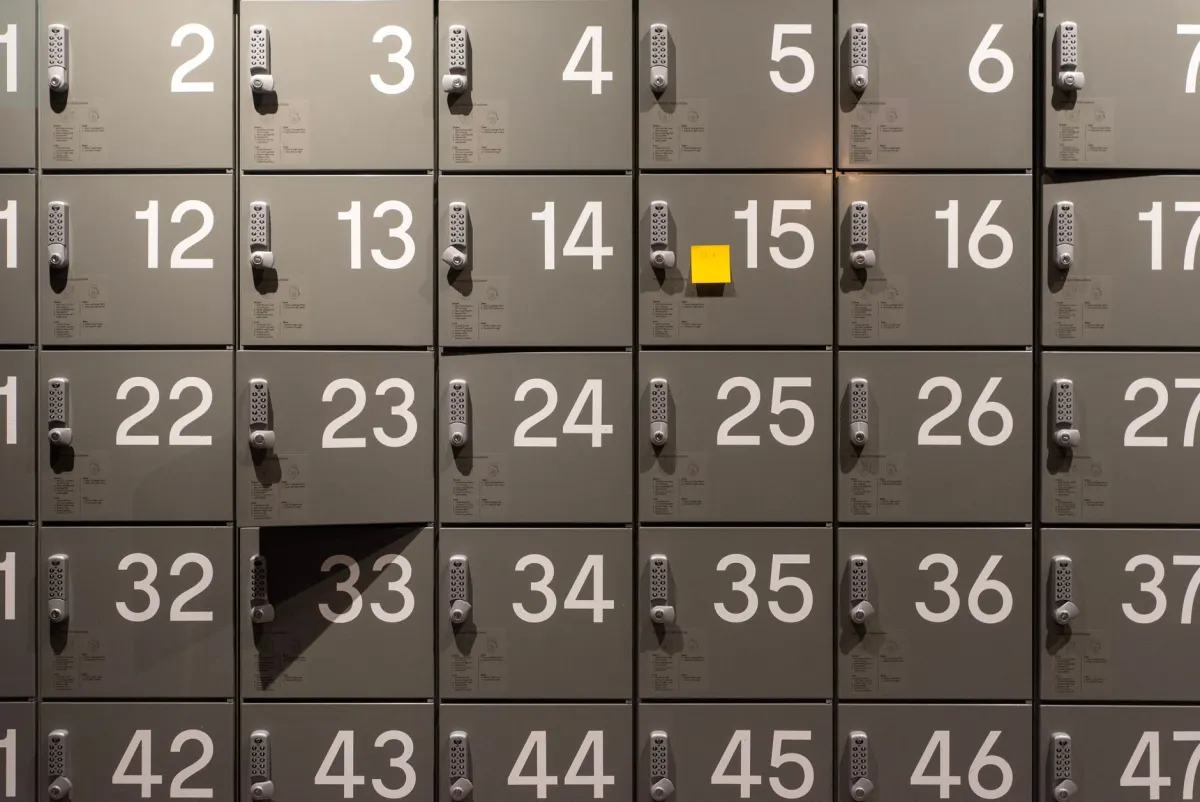A row of numbered sticky notes on a wall, standing in for a thread split into separate numbered drafts that are published in order.