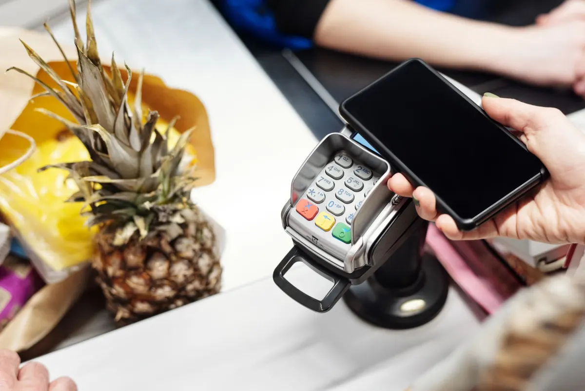 A shopper completing an online checkout, the kind of conversion moment website analytics tools are built to track.