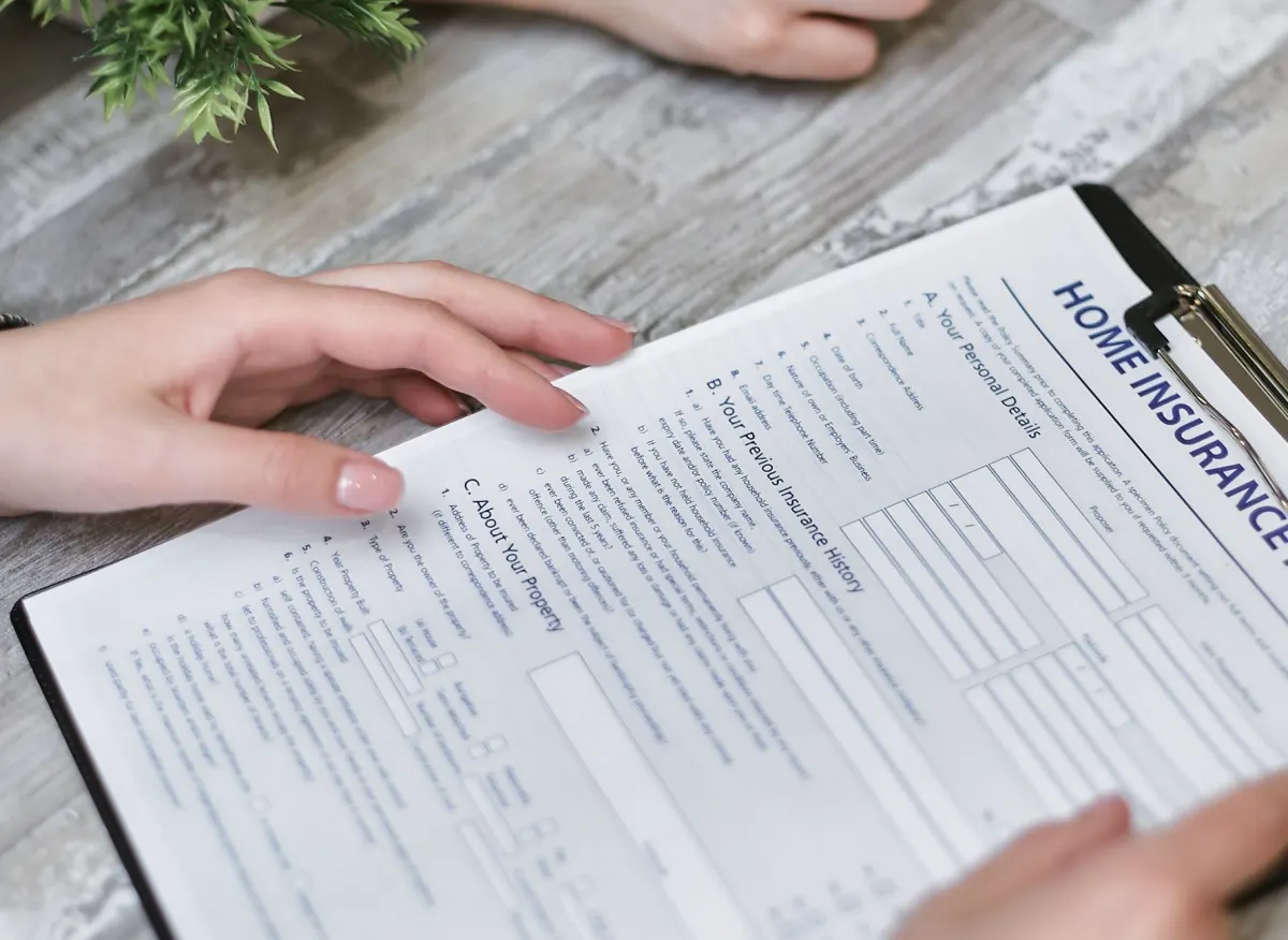Person reading a printed legal document at a desk, reflecting the consent rules that govern data collection like fingerprinting.
