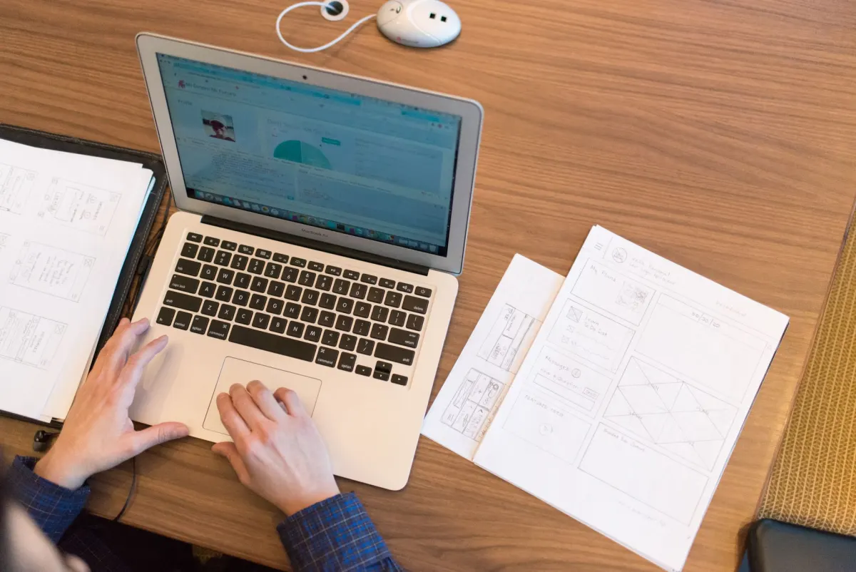 A person logs into an account on a laptop, the moment identity resolution is meant to capture.