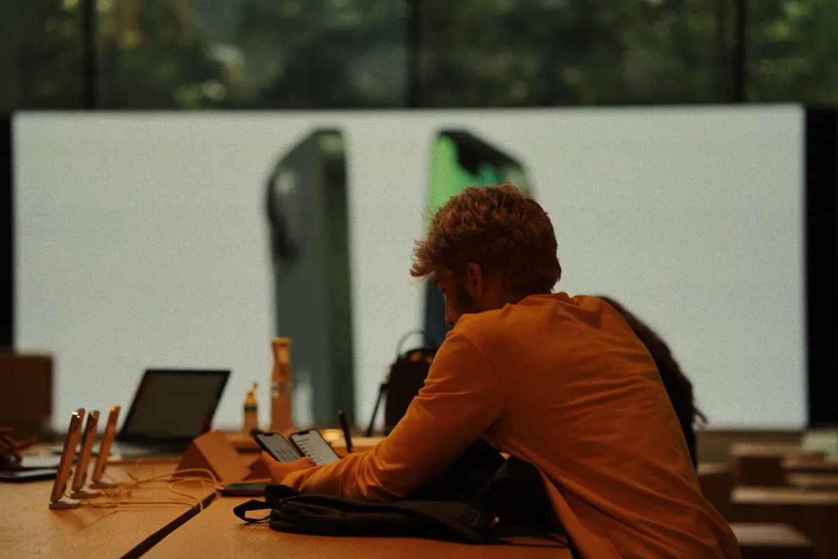 A customer reads a product answer on their phone, the moment a hallucinated brand claim reaches a buyer.